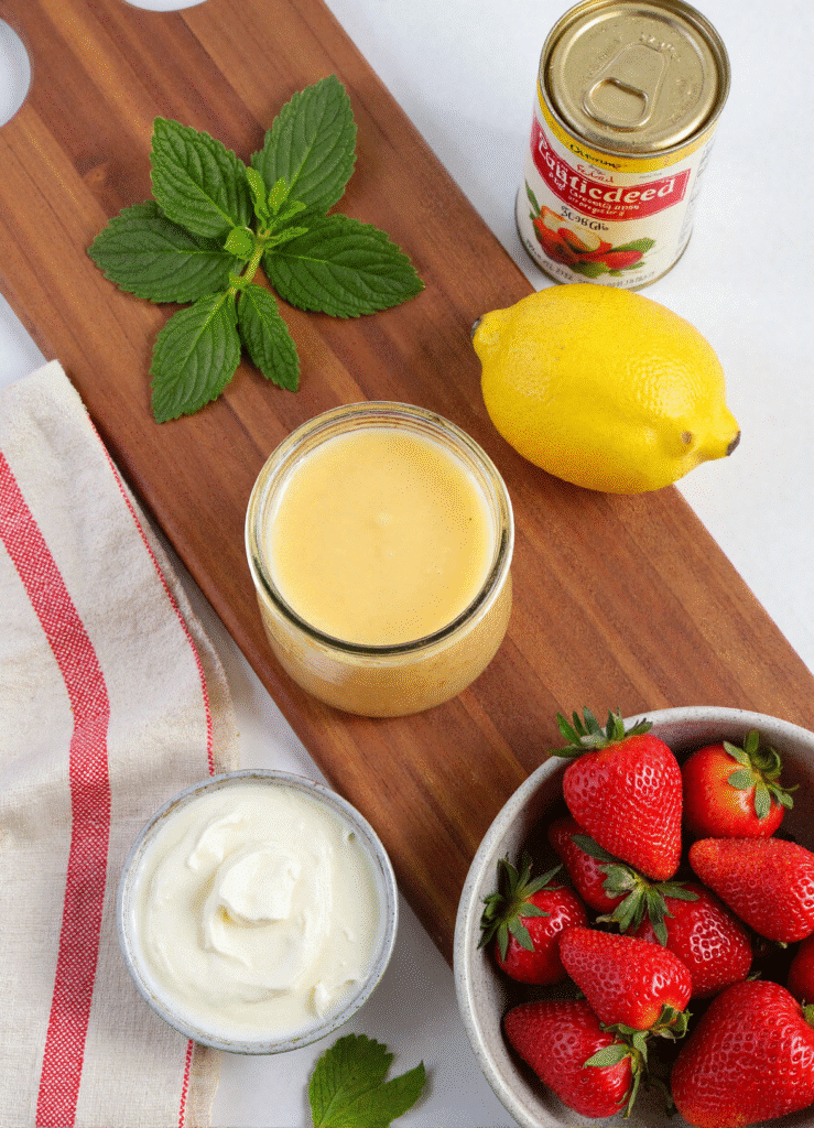 Creamy strawberry apple punch recipe with mint and fruit garnish