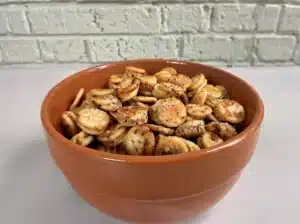 Garlic Bread Ritz Bits snack served in a terracotta bowl close-up