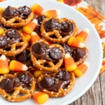 Candy Corn Pretzel Hugs served on a plate
