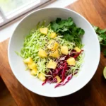 Hawaiian coleslaw recipe with pineapple, lime, and sesame