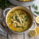 Leftover Turkey Orzo Soup in a Dutch oven with lemon and parsley