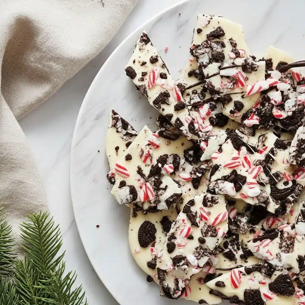 peppermint oreo white chocolate bark with glossy swirl and peppermint bits