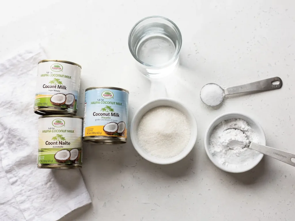 Ingredients for haupia recipe including coconut milk, sugar, and cornstarch