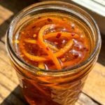 Orange–Chipotle Citrus Fire Jam in glass jar
