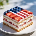 4th of July Icebox Cake slice with berry flag topping