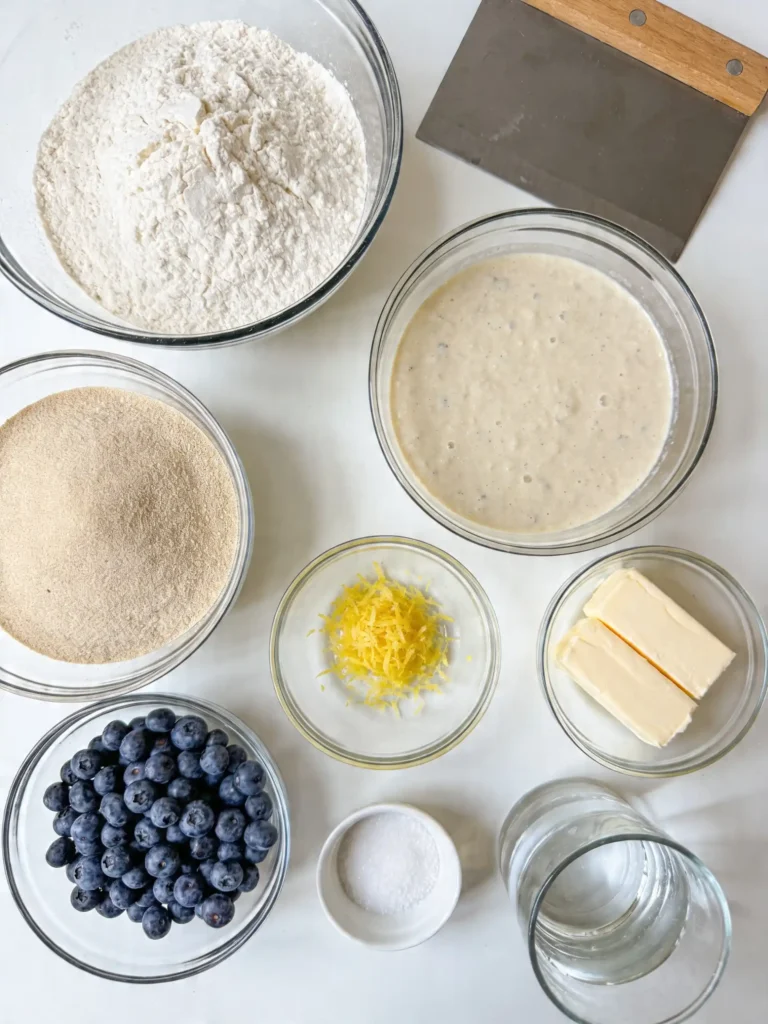 Ingredients for Blueberry Lemon Cream Cheese Sourdough Bread on a kitchen counter